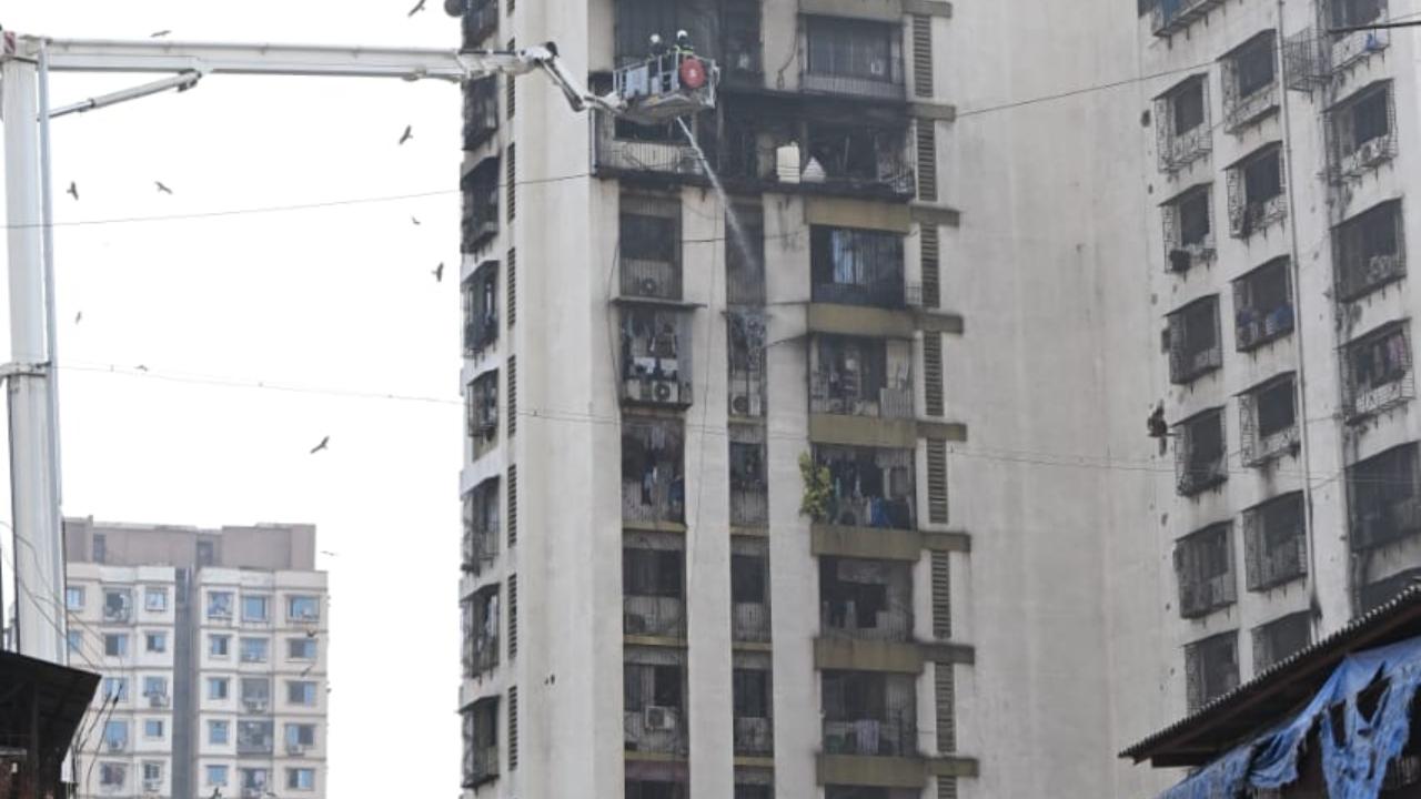 IN PHOTOS: Massive fire breaks out in 15-storey residential building in south Mu