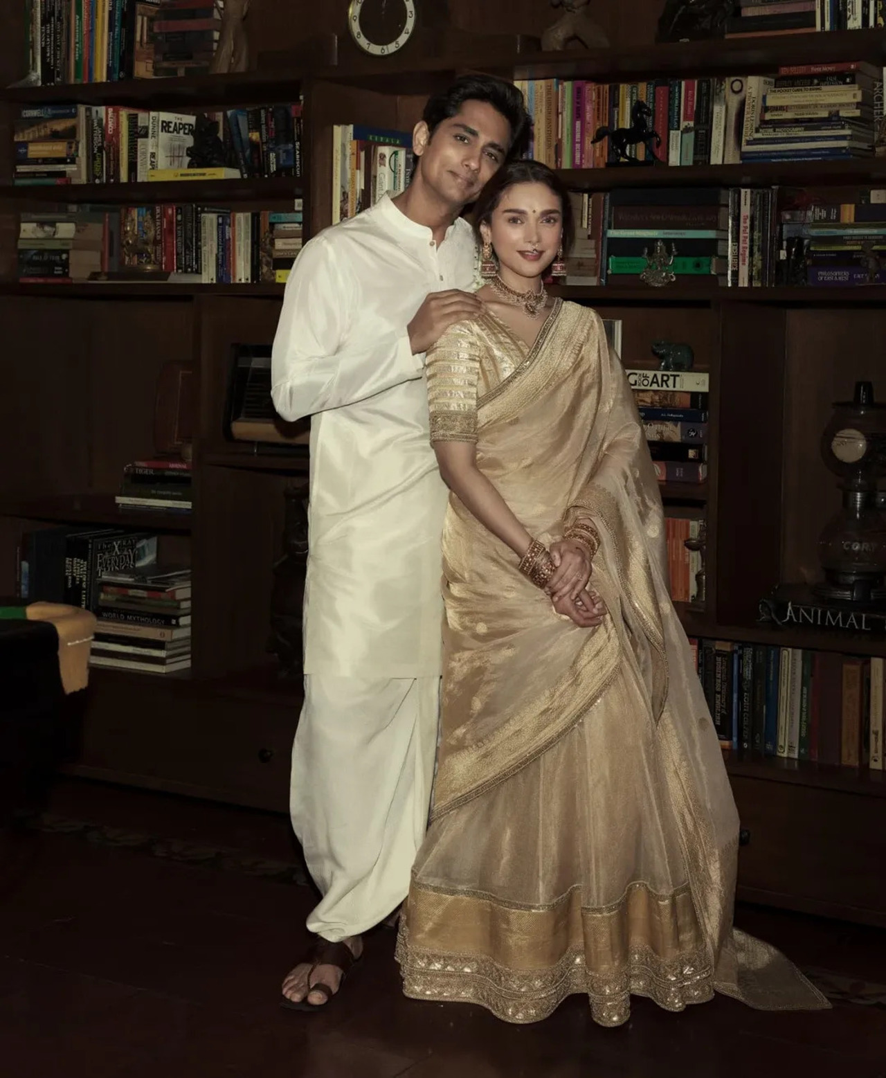 Siddharth well complimented his bride in a Sabyasachi silk kurta and a handwoven Benarasi dhoti with a veshti of his own.