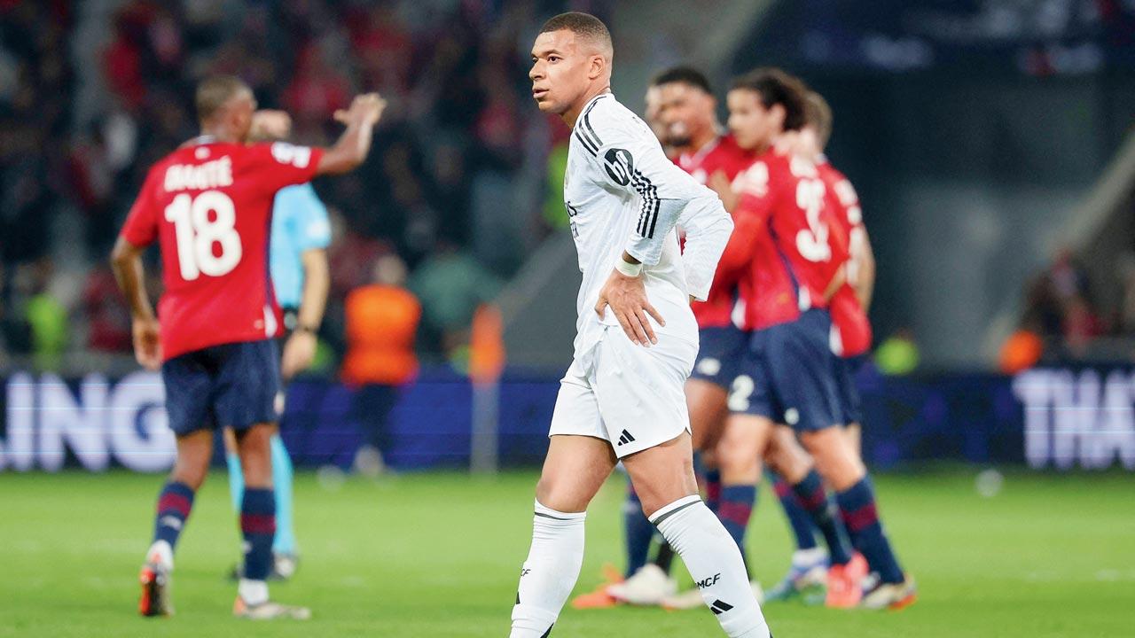 Reigning champions Real Madrid’s 36-match unbeaten run ends with 0-1 defeat to unheralded French side Lille